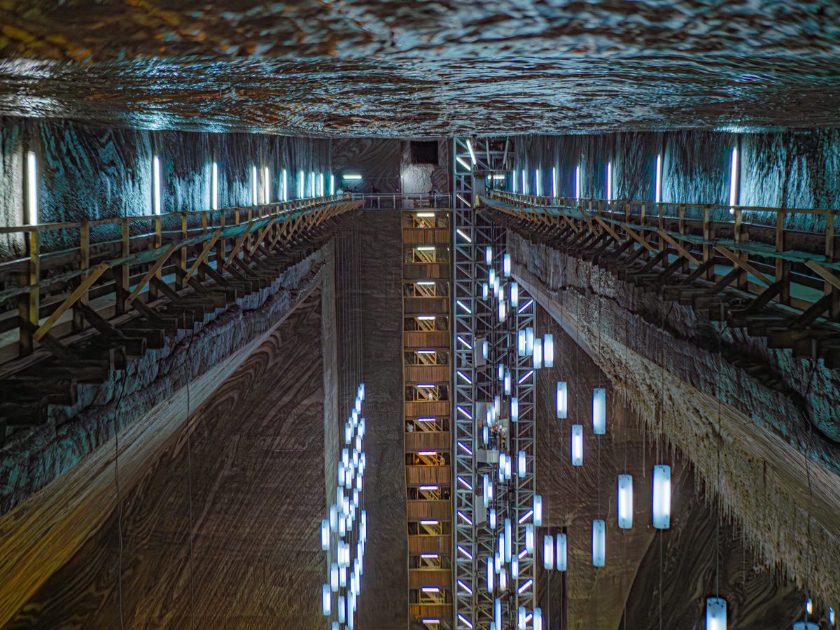 Underground mine passage lit for continuous operation